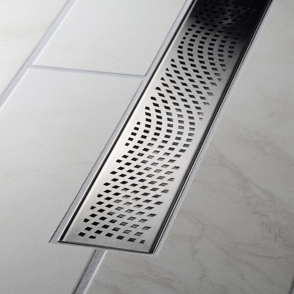 Designlineâ¢ 28 in. Stainless Steel Linear Shower Drain Wave Grate